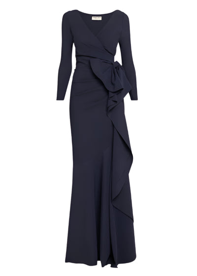 Navy blue evening gown with ruched details on a white background