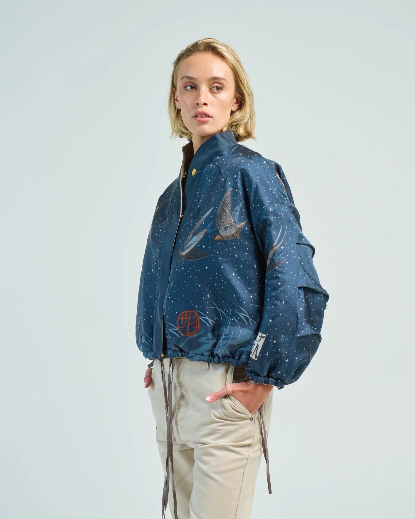 The Lunar Leopard Reversible Silk Twill Bomber Jacket in Champagne/Soot